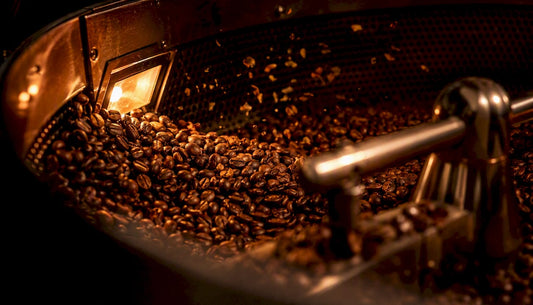 Coffee beans browning inside roasting drum