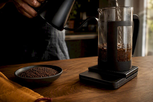 French press coffee being weighed