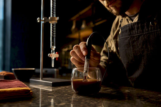 Coffee sample being tested for acidity
