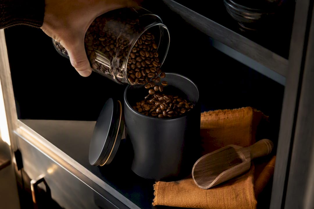 Coffee beans stored in airtight canister